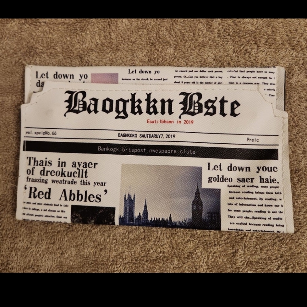 Newspaper clutch handbag.... Very Unique!!